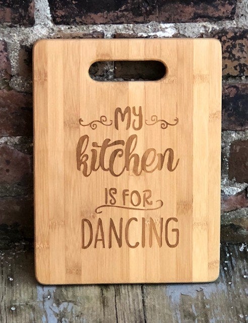 Laser engraved bamboo kitchen cutting board with handle My kitchen is made for Dancing