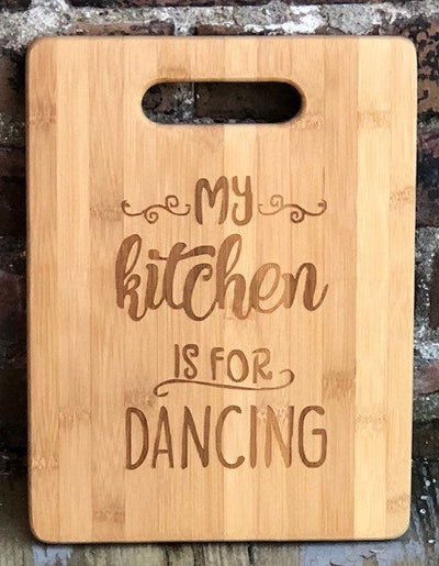 Laser engraved bamboo kitchen cutting board with handle My kitchen is made for Dancing